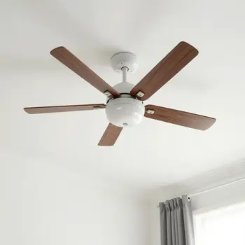 Ceiling fan installation in Las Vegas bedroom for improved air circulation