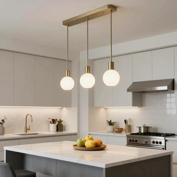 Pendant light installation over kitchen island in Las Vegas home
